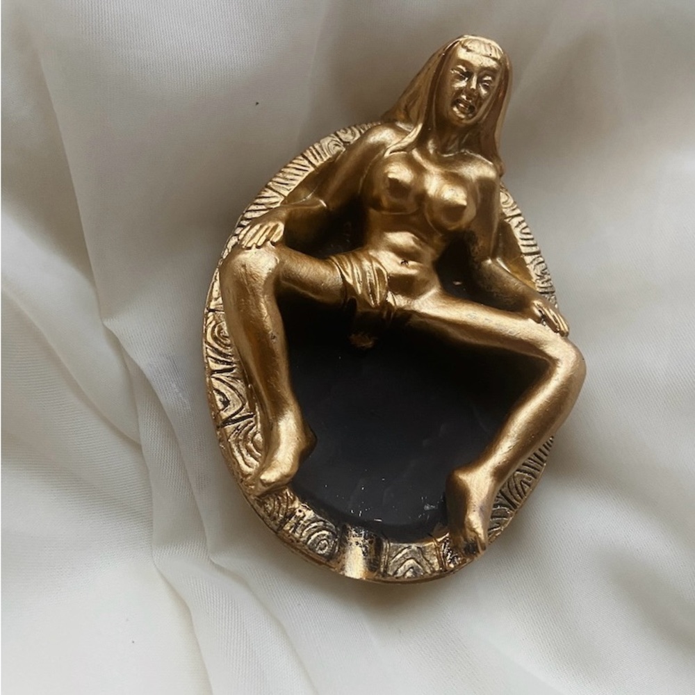 Artistic Gold and Black Figurine